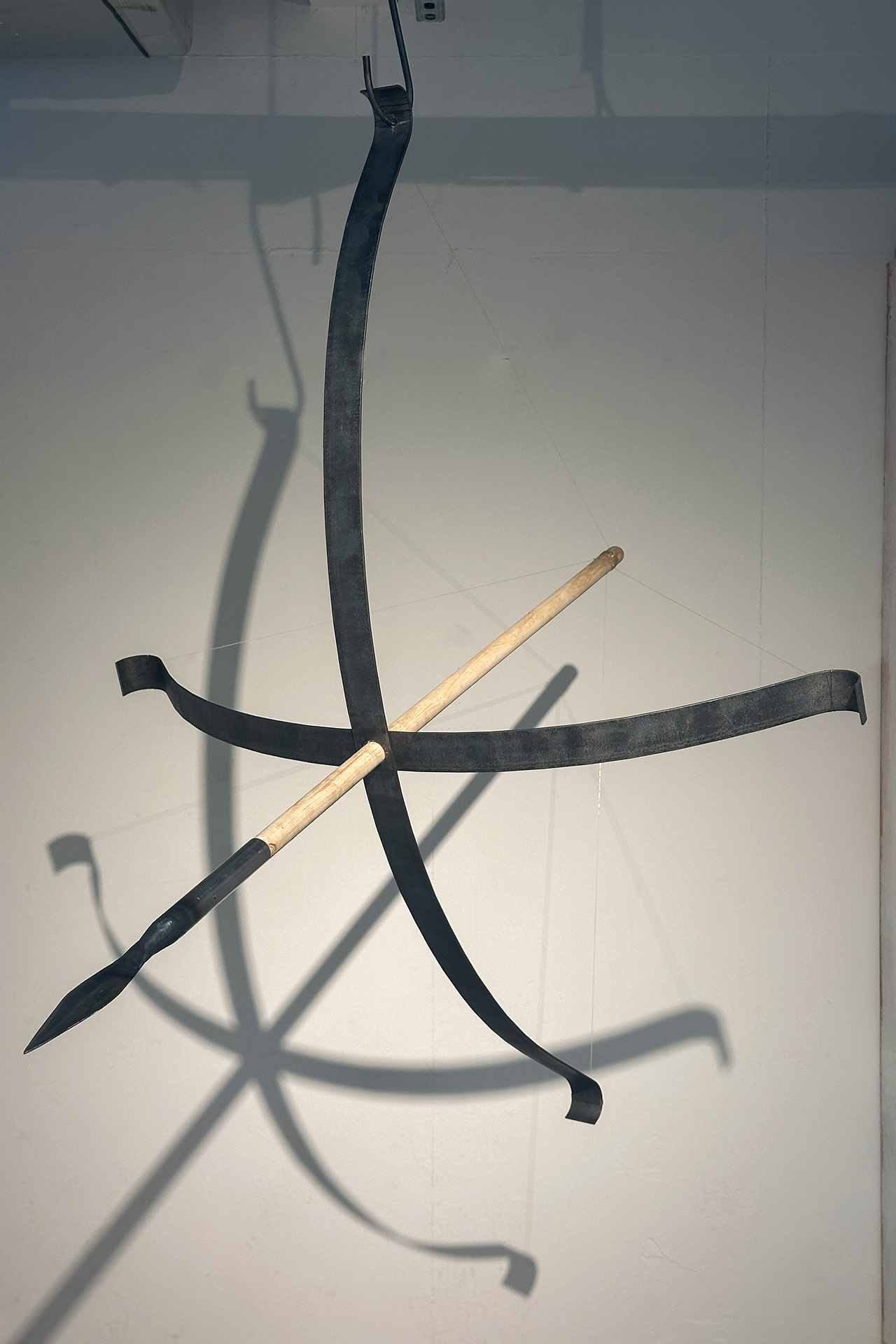 Medium: Mild steel, wood, fish wire.