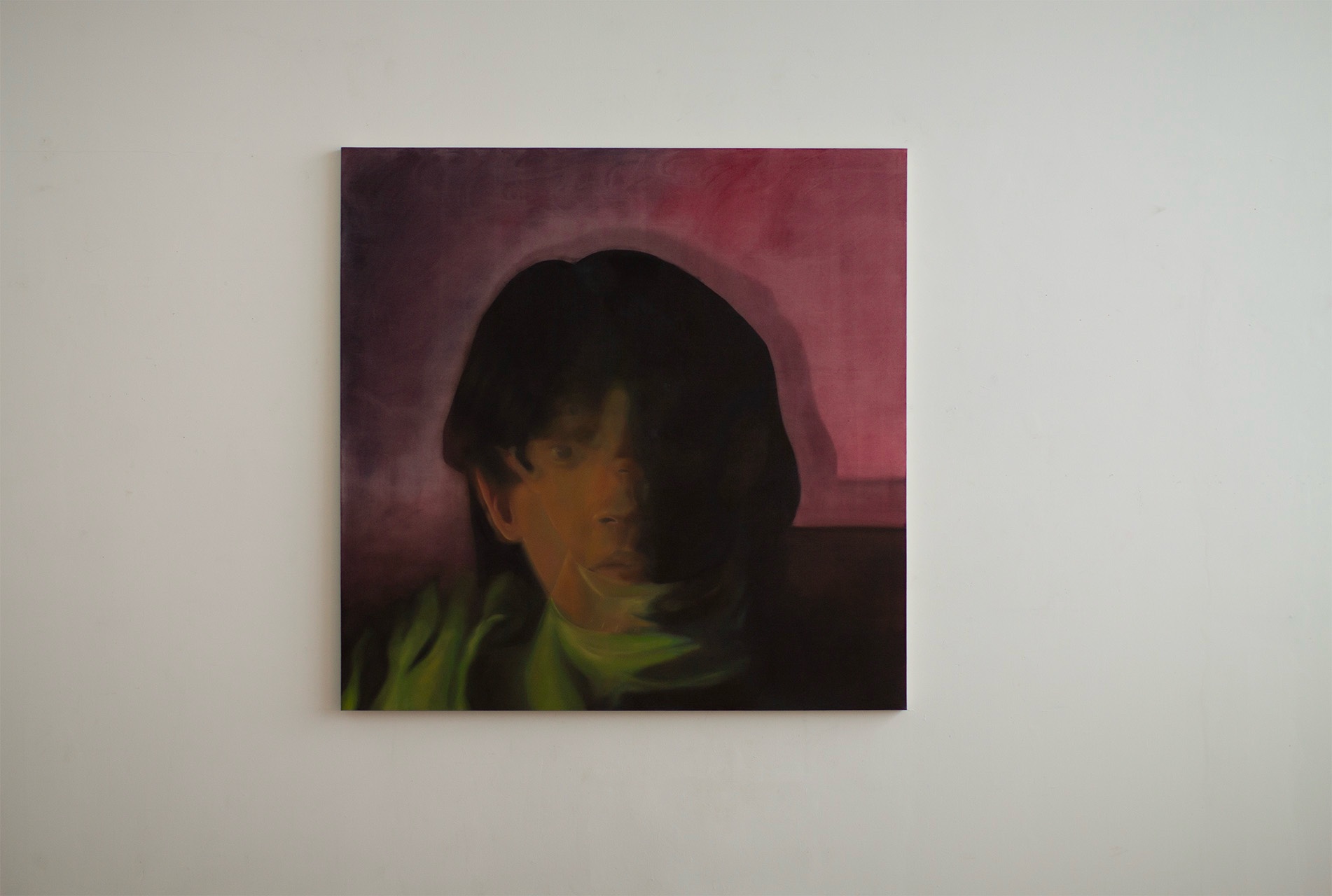 A large portrait using a double exposure effect, layering two images of the same face so that the subject’s gaze appears duplicated. The overlapping faces create a sense of motion or introspection. The background blends shades of purple and pink.