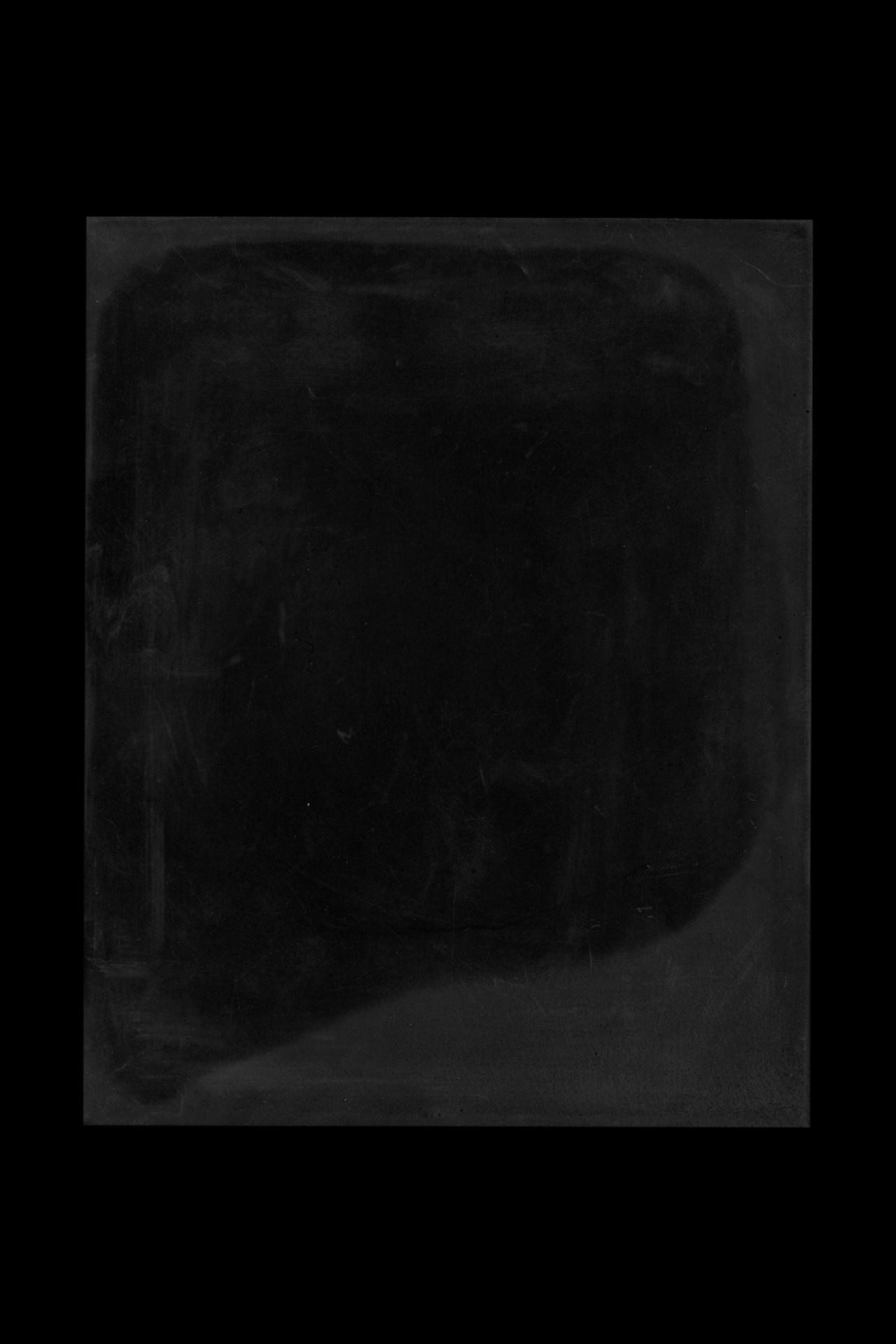 Black mirror sculpture, with subtle change in reflectiveness across the surface