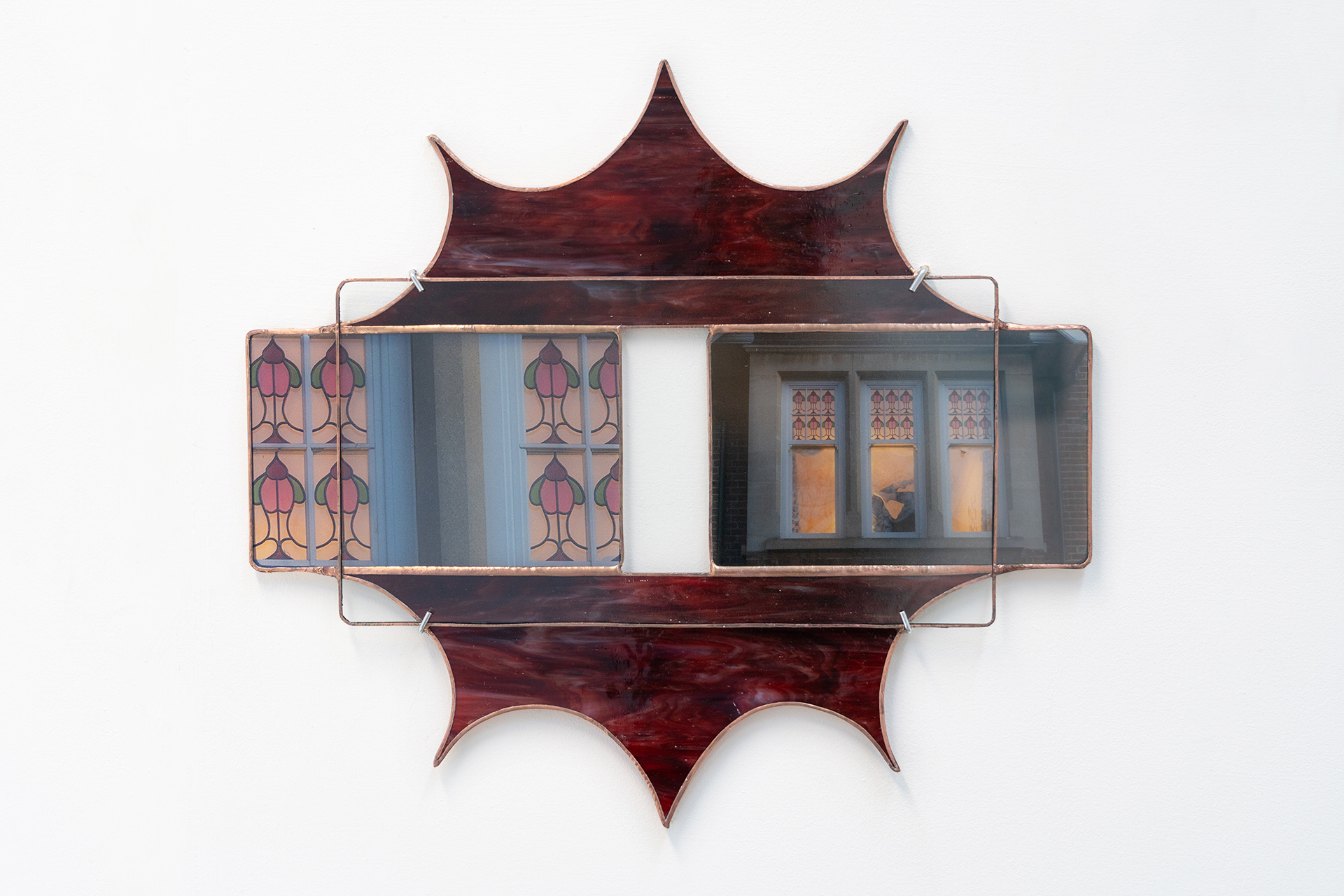 Layered stained glass star with photos of stained glass and a window. 