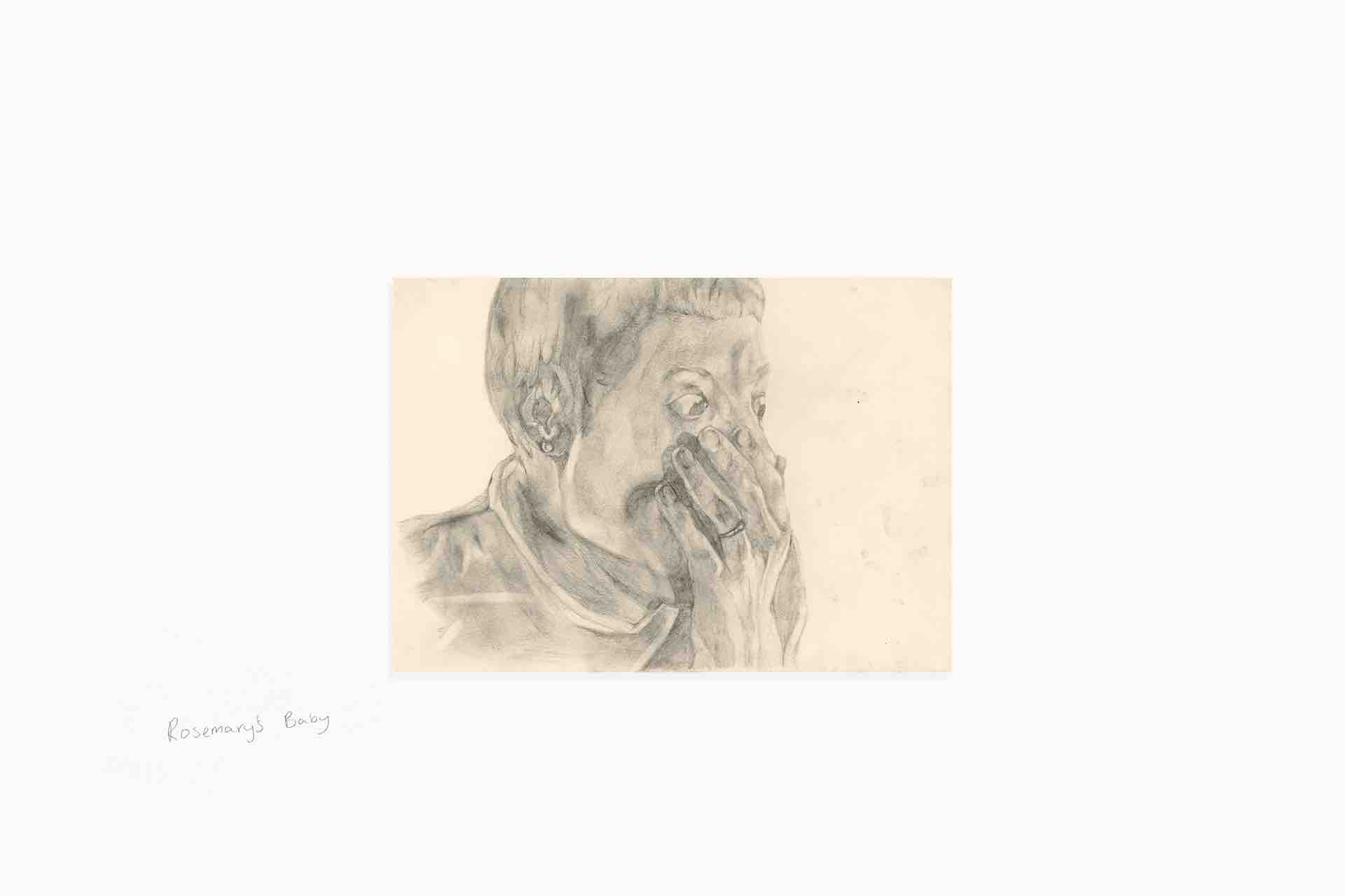 A 21 x 14.5cm graphite drawing of Mia Farrow as the titular character of the film 'Rosemary's Baby'. The film title is written on the wall next to it.