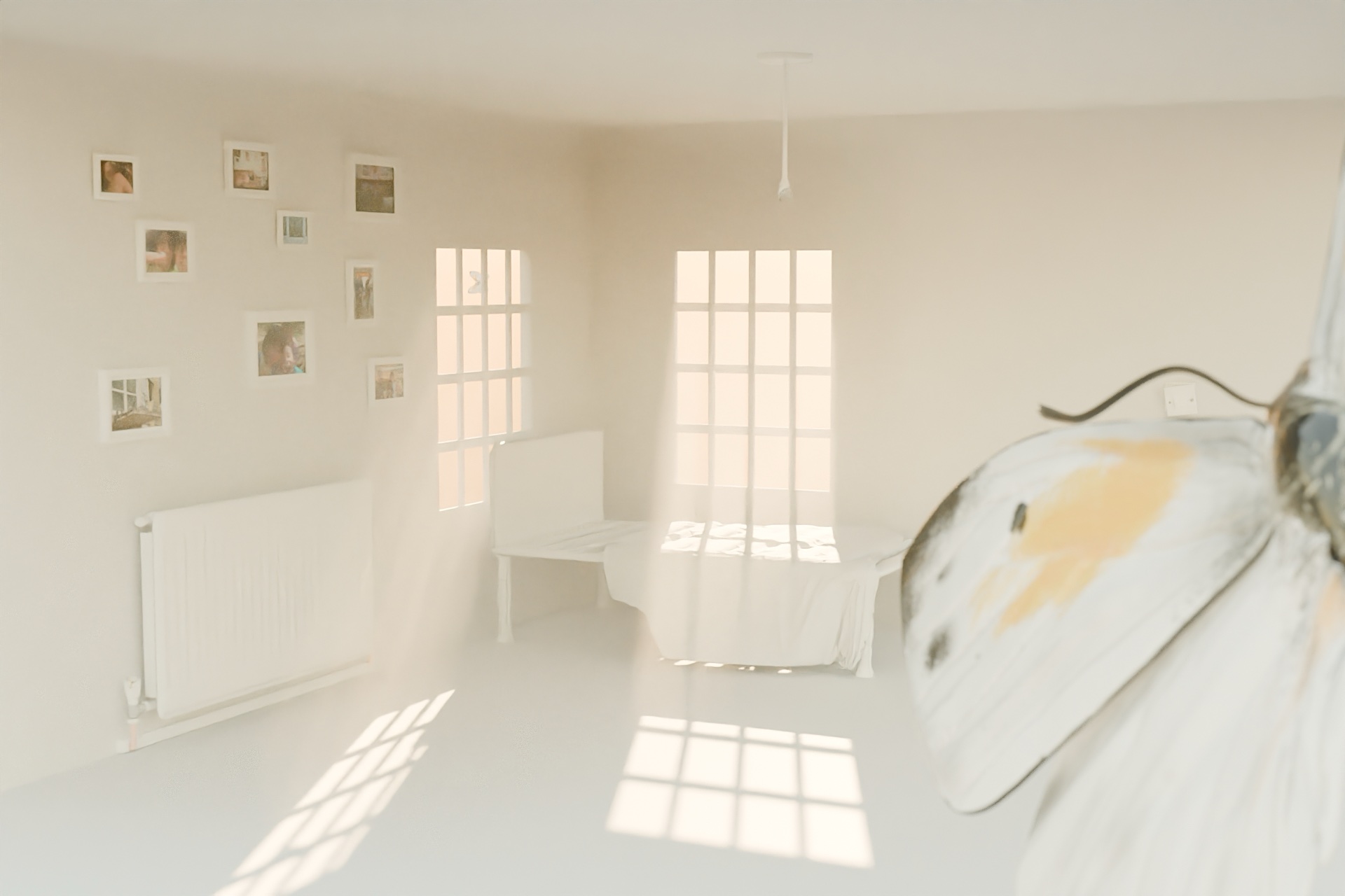 A white room, a radiator sits on the left side with the bed in the centre. 